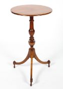 A 19th century tripod occasional table,