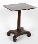 A William IV mahogany tilt top table on waisted rectangular base, issuing scroll feet,