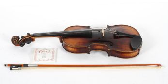 A violin with a two piece back, Stradivarius paper label,