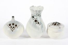 A group of three Studio pottery vases, each pierced with apertures,