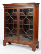 A George III style mahogany glazed display cabinet, probably early 20th century,