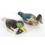 Folk Art: Two wooden decoy ducks, adzed and painted, paper label saying 'Original by Peter ****',