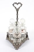 A Victorian silver plated three decanter stand and three glass decanters,