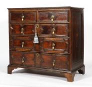 A Carolean style oak chest of two short and three long drawers, probably 18th century,