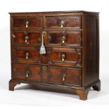 A Carolean style oak chest of two short and three long drawers, probably 18th century,