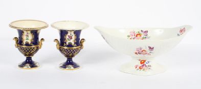An English porcelain footed comport, circa 1800, of oval form, painted with floral sprays,