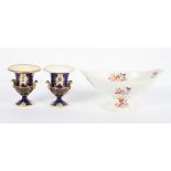 An English porcelain footed comport, circa 1800, of oval form, painted with floral sprays,