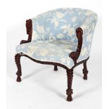 An Anglo Indian style tub chair, the upholstered back and serpentine seat on a rope carved frame,