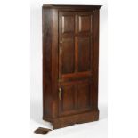 A 19th century oak corner hall robe, with two panelled doors,