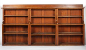 A Victorian three part mahogany bookcase, each of rectangular section with three shelves,