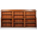 A Victorian three part mahogany bookcase, each of rectangular section with three shelves,