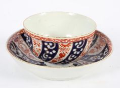 A Worcester Tea Bowl and Saucer, circa 1770, in the 'Queen Charlotte' pattern, square seal marks,