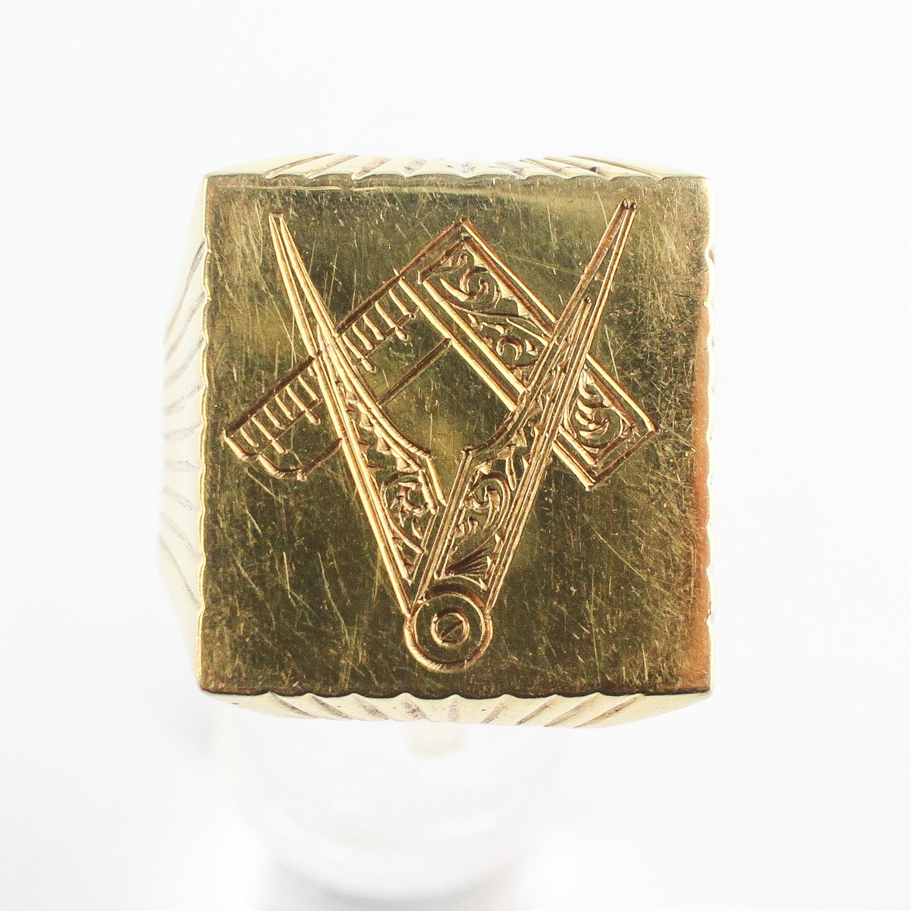 A large yellow metal square head signet ring with masonic engraving. - Image 2 of 4