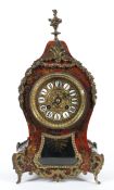 A French Boulle style gilt metal mounted striking mantle clock, late 19th/early 20th century,