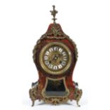 A French Boulle style gilt metal mounted striking mantle clock, late 19th/early 20th century,