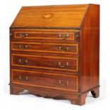 A Sheraton Revival mahogany and inlaid bureau, the fall front enclosing a fitted interior,