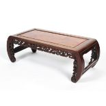 A Chinese hardwood opium or coffee table, with foliate carved frieze and curved legs, 32cm high,