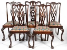 A set of five Chippendale style mahogany century chairs, late 19th century,