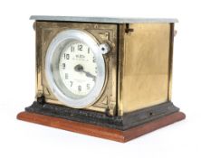 An early 20th century vintage Blick time recorder, brass cased with enamel face,