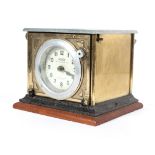 An early 20th century vintage Blick time recorder, brass cased with enamel face,