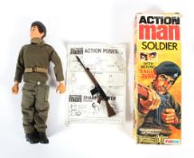 A vintage Palitoy Action Man figure, 'Soldier with Moving Eagle Eyes', with gun, cap,
