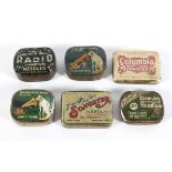 A collection of early 20th century gramophone needles in vintage needle tins,