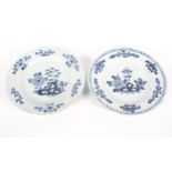 A near pair of English delftware blue and white chargers, circa 1760, London or Bristol,