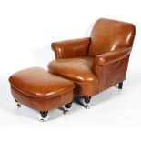 A contemporary Laura Ashley tan leather armchair and a kidney-shaped stool,