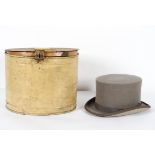 A vintage Young's grey top hat, in a tin hat box