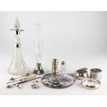 A selection of silver and plated items, silver mounted glass bottle and other items