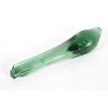 A large green glass clump, of extended dump form, with bubble inclusions,