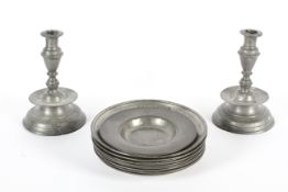 A collection of pewter plates and dishes, 19th century, stamped X & Crown marks,
