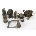 A collection of World War 2 aircraft dials, perhaps from a Spitfire, including an altimeter,