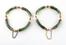 A pair of bracelets of identical design having cylindrical links in the style of nephrite jade