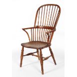 An elm and yew Windsor chair, late 19th/early 20th century, with high hoop spindle back,