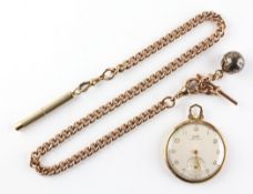 A yellow gold open face Tissot pocket watch. Circular champagne dial with numerical markings.