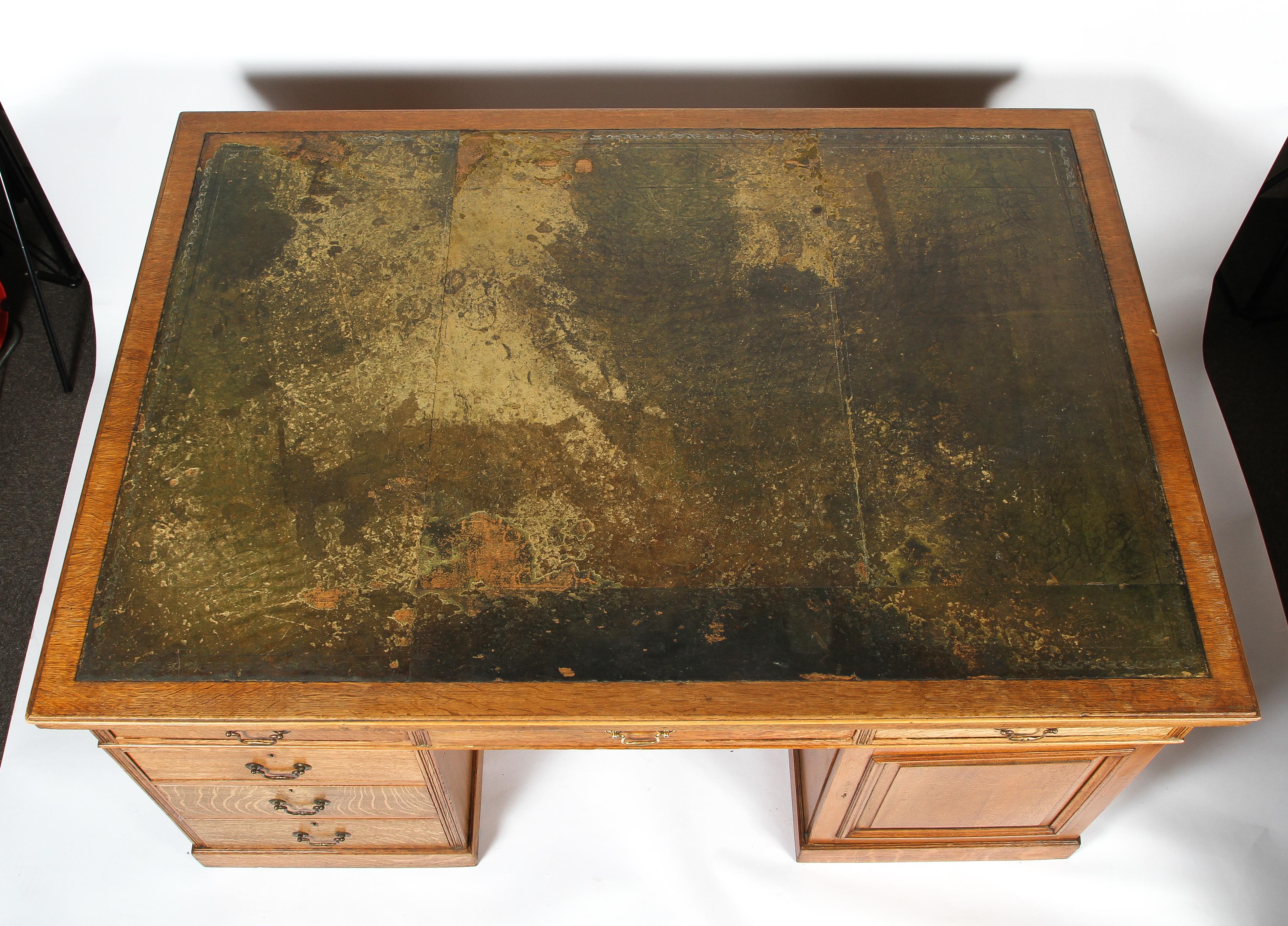 A large oak partner's desk, early 20th century, inset with green leather top, - Image 7 of 7