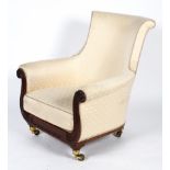 A Regency style armchair, with a scrolled back and arms on a carved frame, with cream upholstery,