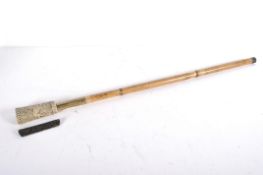 A malacca, brass and carved bone mounted walking stick/cane,