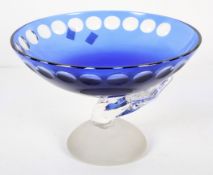 A 20th Century studio glass bowl, with blue flashed glass body, 21cm high x 31cm diameter.