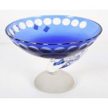 A 20th Century studio glass bowl, with blue flashed glass body, 21cm high x 31cm diameter.