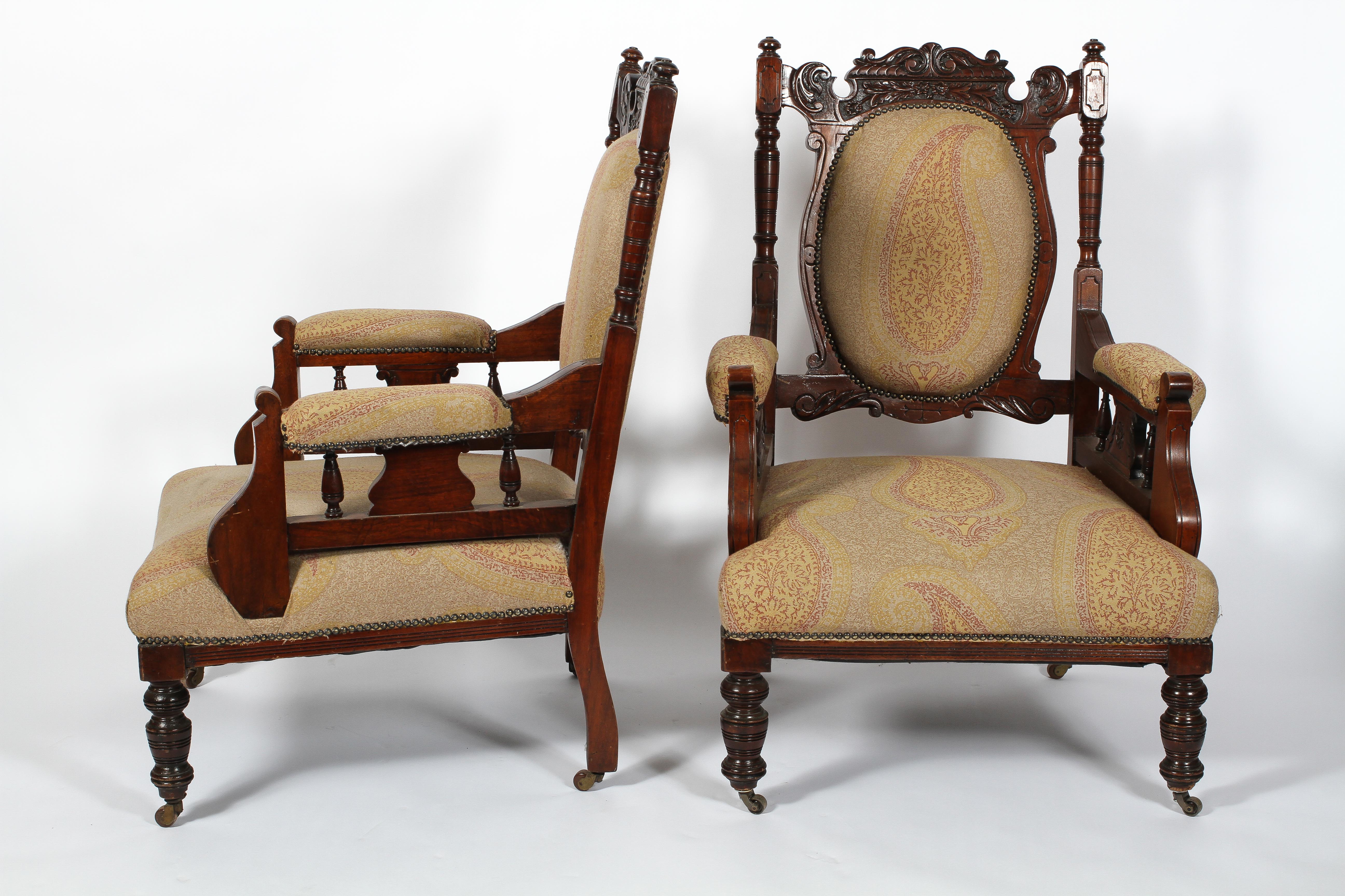 A pair of late Victorian armchairs, with upholstered back, arm rests and seat, - Image 2 of 2