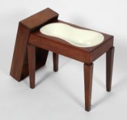 A 19th century mahogany commode/bidet, with Wedgwood stoneware bowl, 51cm high, 55cm wide,