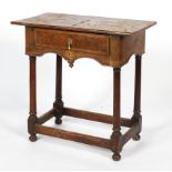 An 18th century walnut low boy,