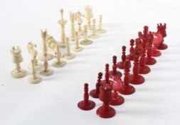 A Victorian ivory and bone chess set, the King 9.5cm tall, high damages.