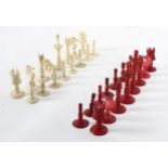 A Victorian ivory and bone chess set, the King 9.5cm tall, high damages.