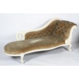 A Victorian white painted chaise longue, with scroll back and button back side rest,