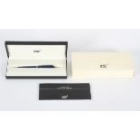 A Mont Blanc ballpoint pen in blue and silver, fitted in black case with writing instructions,