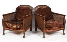 Two Victorian upholstered bergere armchars, late 19th century,