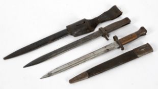 Two Bayonettes, one with leather scabbard, the blade stamped mole 497,